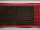 Full layout of the black and red Sambalpuri cotton saree displaying the complete pattern and border design.