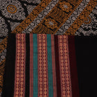 Full view of a blue and black Bomkai cotton saree with intricate butta pattern.