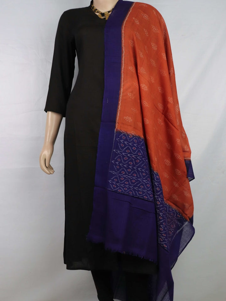 Stylish brown cotton dupatta with blue motifs, draped gracefully on a model