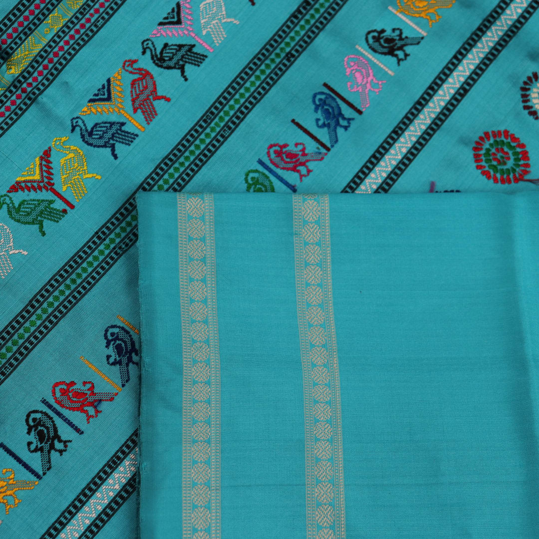 Close-up view of intricate butta pattern on the silk fabric of the black Dolabedi saree