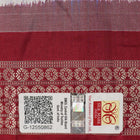 Close-up of the luxurious silk texture of the violet and maroon Sambalpuri Saree fabric.