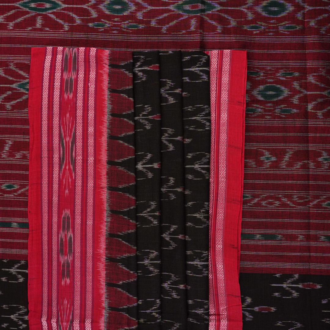 Model draped in a black and red Sambalpuri cotton saree showing traditional Odisha handloom styling.