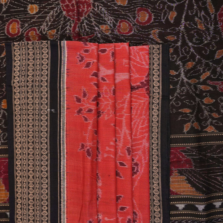 Full layout view of a rust and black Sambalpuri cotton saree displaying the complete body pattern and motifs.