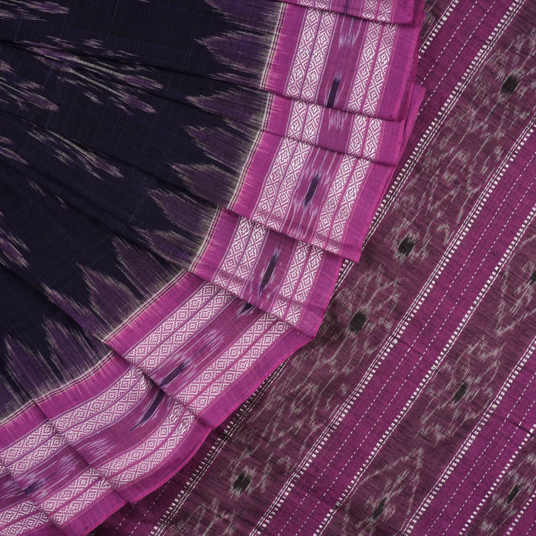 Full styling view of a model draped in a blue and purple Sambalpuri cotton saree with ikat motifs.