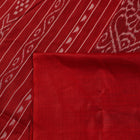 Close-up of green and red tussar silk saree fabric texture