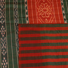 Close-up of plain off-white Tussar silk saree fabric, showing natural slub texture and rust weave.