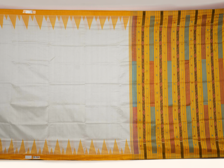 Close-up of the smooth texture and plain weave of white Sambalpuri silk fabric.