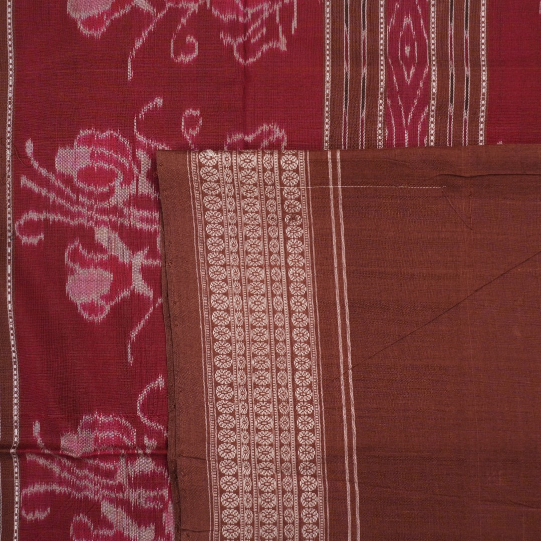 Full layout of the black and brown Sambalpuri cotton saree displaying motifs across the body and pallu.