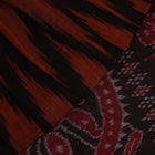 Brown and black plain Sambalpuri cotton saree elegantly draped.