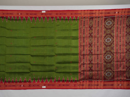 Model draped in a green and red Khandua silk saree with traditional butta work and rich border.