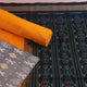 Grey and yellow Sambalpuri cotton dress material blouse piece with motifs.