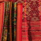Green Khandua silk saree styled and draped to showcase the Nabakothi pattern, a traditional handloom saree.
