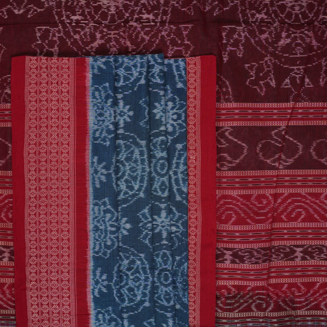 Full flat layout of the blue and maroon Sambalpuri cotton saree displaying the complete motifs and border pattern.