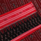 Model wearing a black and red Sambalpuri cotton saree, showing drape and overall style.