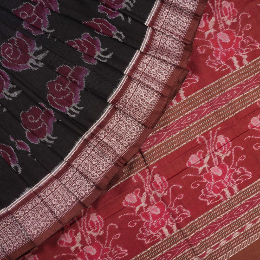 Full layout of the black and brown Sambalpuri cotton saree displaying motifs across the body and pallu.