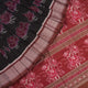 Full layout of the black and brown Sambalpuri cotton saree displaying motifs across the body and pallu.