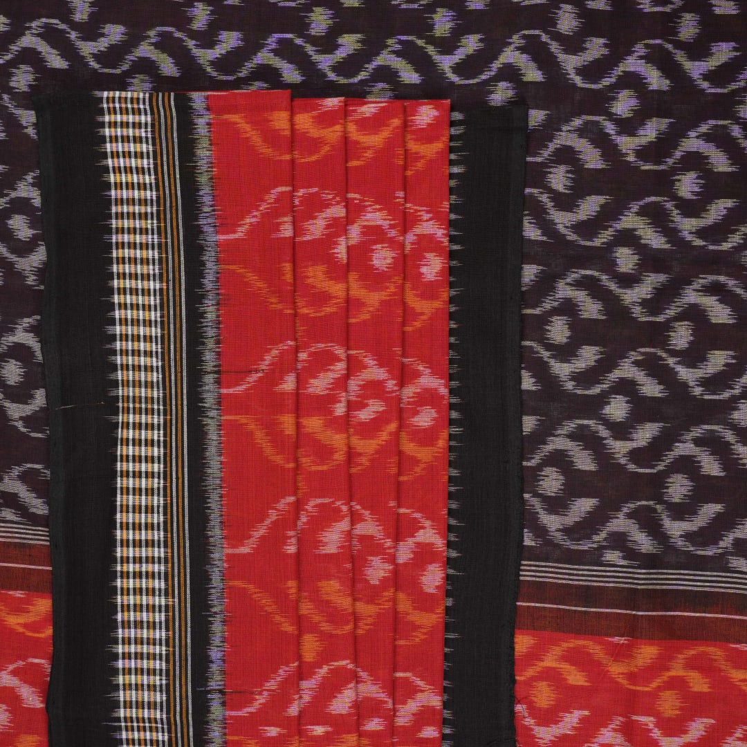 Model draped in a maroon and black Sambalpuri cotton saree showcasing elegant traditional handloom style