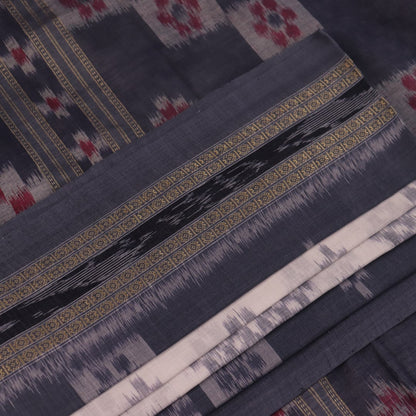 Draped view of white and grey Sambalpuri cotton saree with motifs.