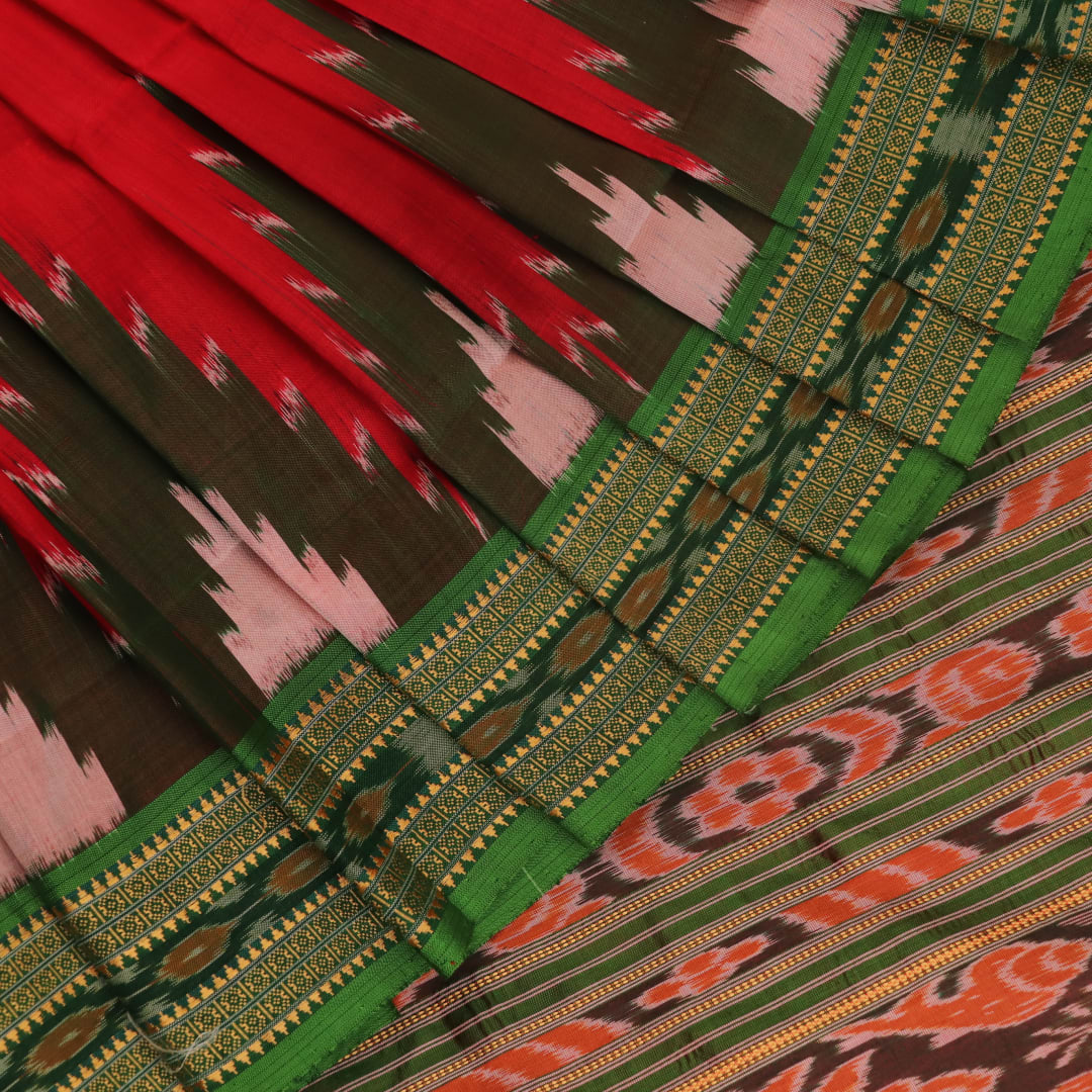 Red and green Khandua silk saree draped, showcasing the overall look and fall.