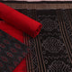 Black and red Sambalpuri cotton blouse piece with motifs.