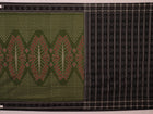 Green and black Sambalpuri cotton saree with motifs, elegantly draped.
