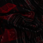 Red and black Sambalpuri cotton saree draped, showcasing overall styling and motifs.