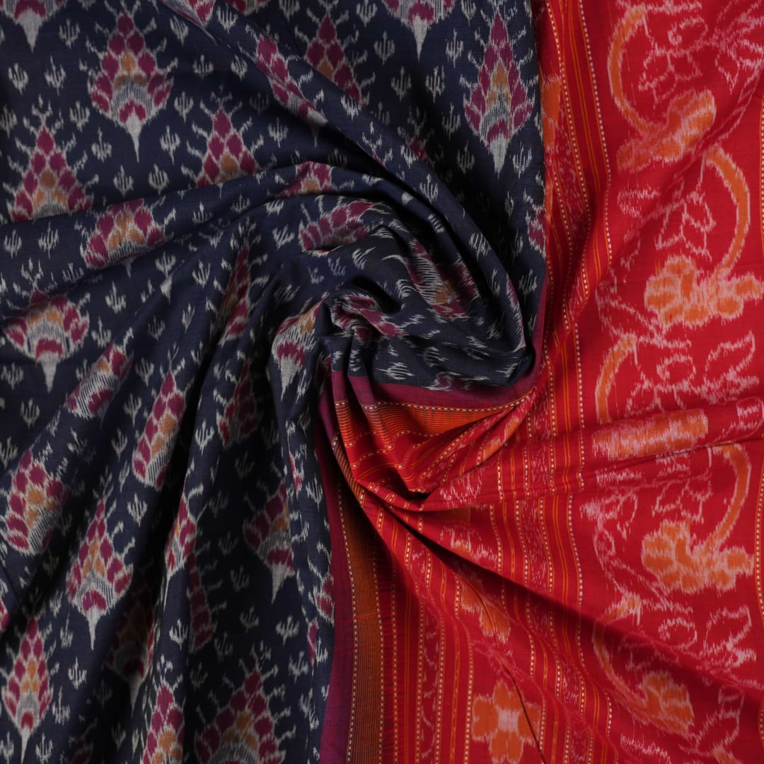 Full flat layout of a black and red Sambalpuri cotton saree showing the complete design, pallu, and border.
