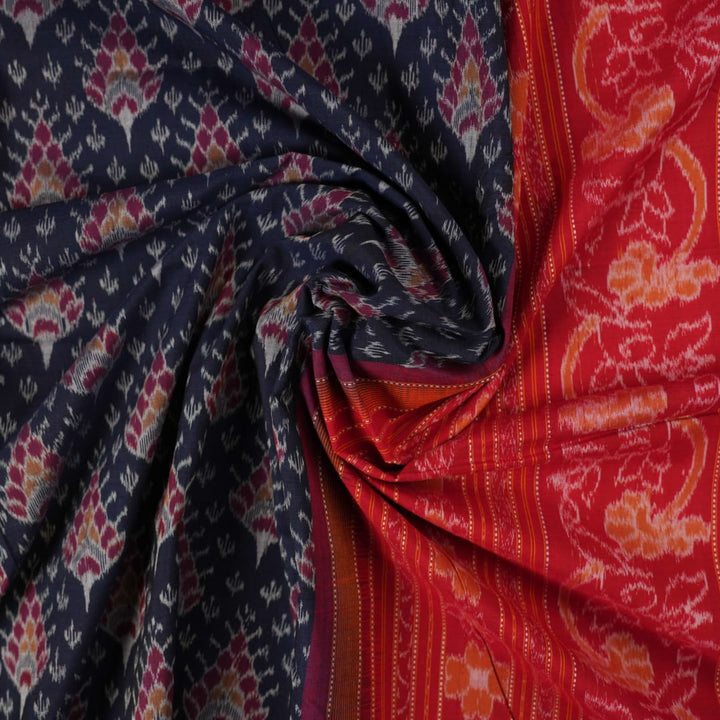 Full flat layout of a black and red Sambalpuri cotton saree showing the complete design, pallu, and border.