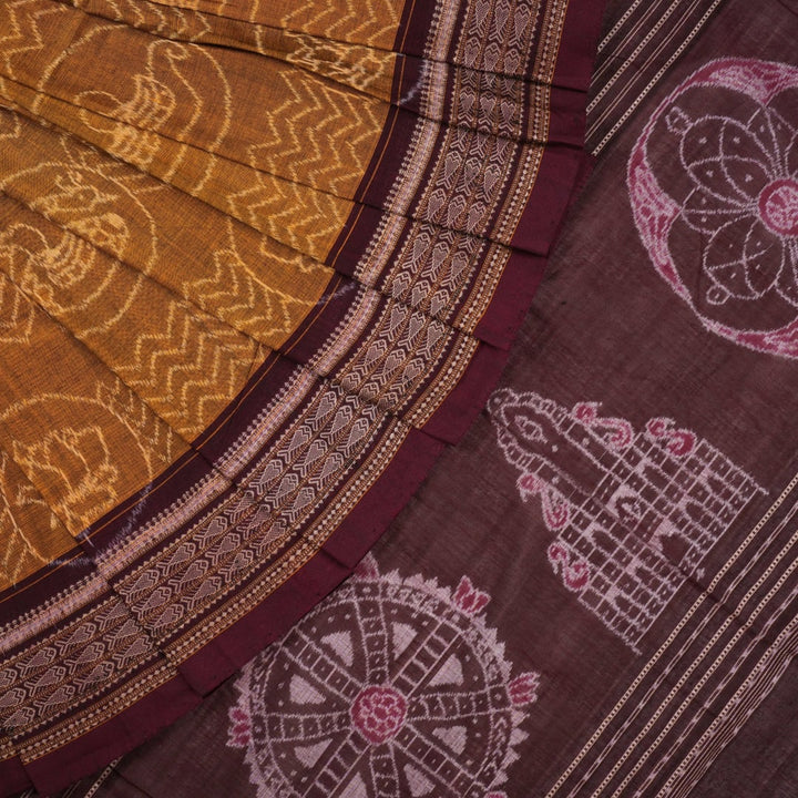 Full layout of the brown and maroon Sambalpuri cotton saree showing the complete body pattern and border.