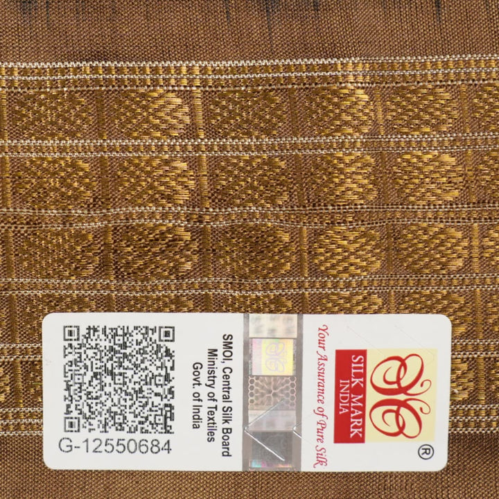 Close-up revealing the delicate, lustrous texture of the black silk tissue saree fabric with subtle sheen.