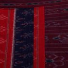 Blue Sambalpuri cotton saree draped, showcasing motifs and styling.