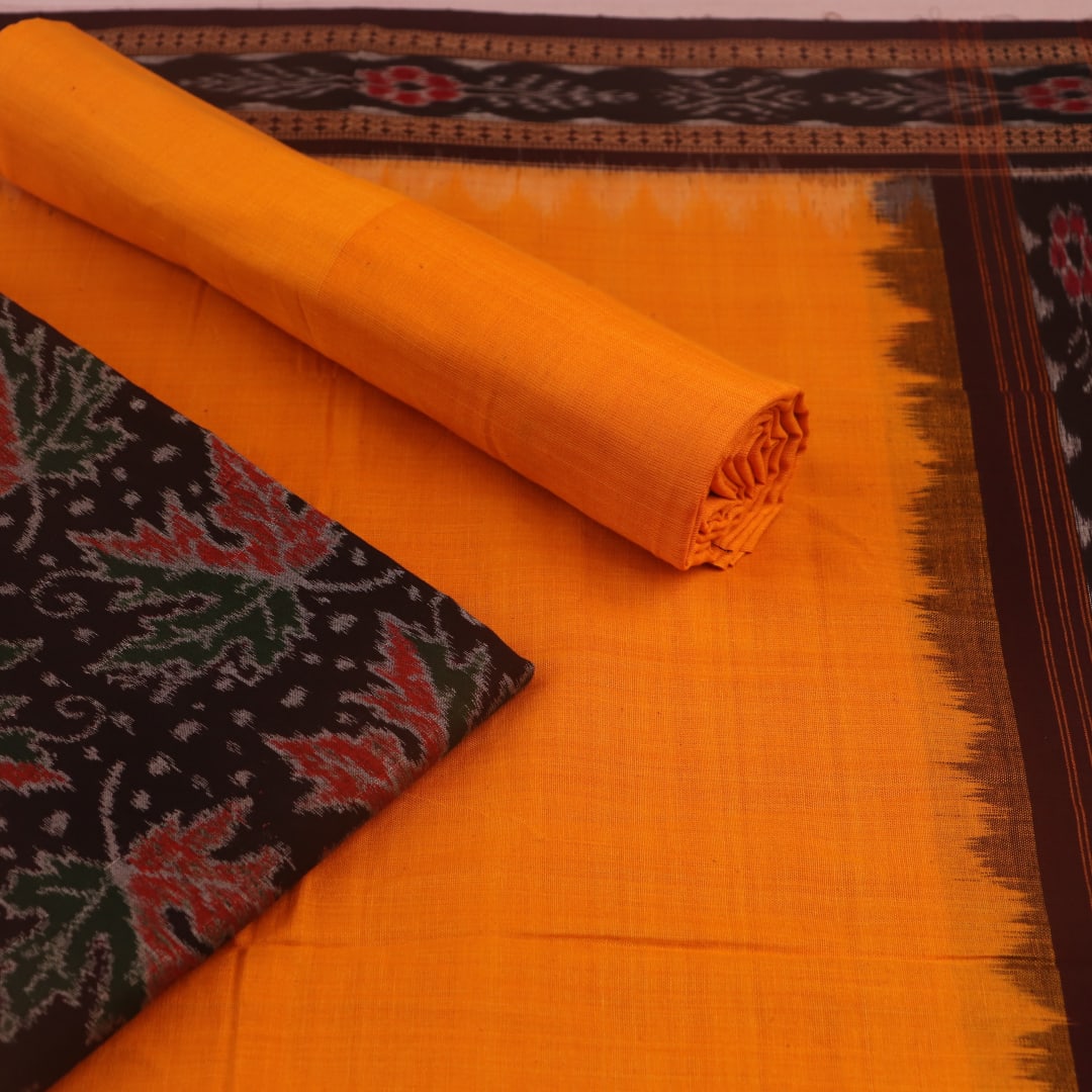 Close-up of the brown and yellow Sambalpuri cotton dress material blouse piece, with motifs.