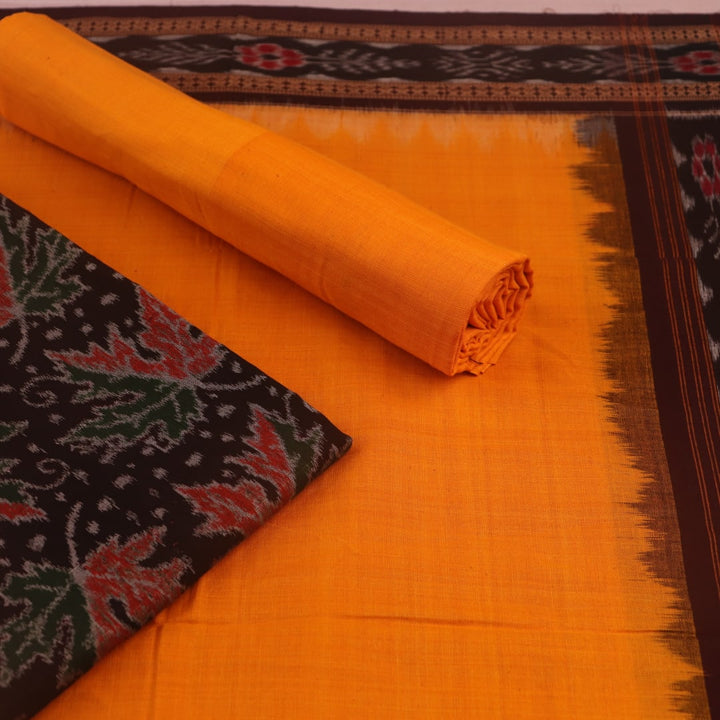 Close-up of the brown and yellow Sambalpuri cotton dress material blouse piece, with motifs.