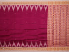 Pink and off white silk Khandua saree draped in a stylish manner, showcasing the intricate butta pattern and border details.