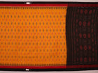 Styling shot showcasing a draped yellow and black Sambalpuri cotton saree with motif details.