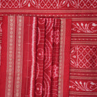 Full view of the maroon Sambalpuri silk saree with traditional motifs, displaying entire length and border.