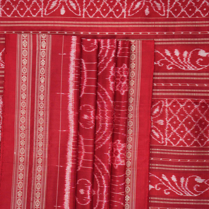 Full view of the maroon Sambalpuri silk saree with traditional motifs, displaying entire length and border.