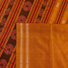 Close-up fabric texture of a magenta Sambalpuri Silk Saree with yellow butta pattern.