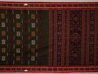 Full view of a green and rust cotton Bomkai saree with traditional butta patterns.
