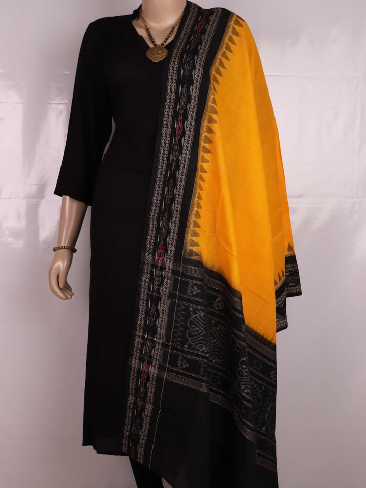 Yellow and black Sambalpuri cotton dupatta draped on a woman