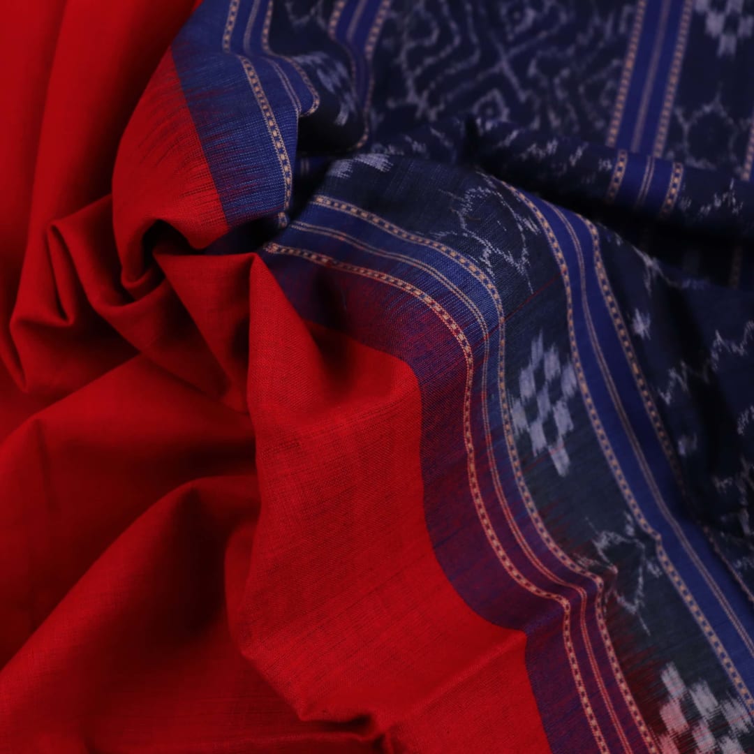 Styling view of a red and blue Sambalpuri cotton dupatta with plain pattern and tassels