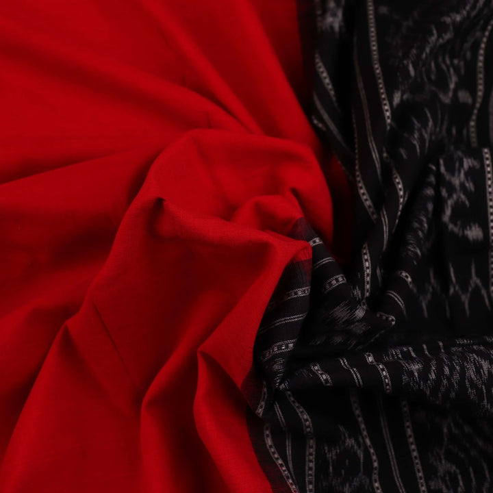 Sambalpuri Cotton Dupatta in Red and Black, with a plain pattern, draped for styling.