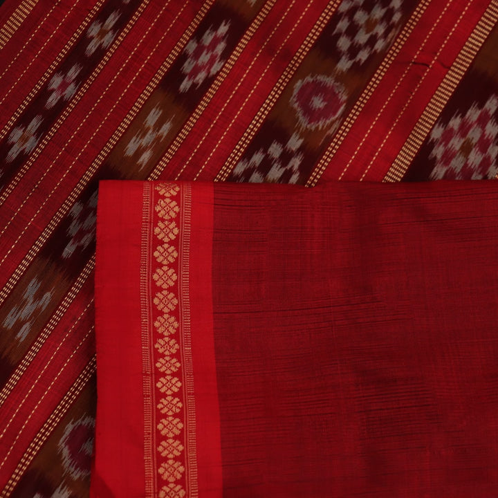 Full view of a black Khandua silk saree with red motifs.