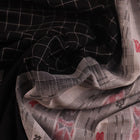 Full view of a Black and White Sambalpuri Cotton Saree with Butta pattern.