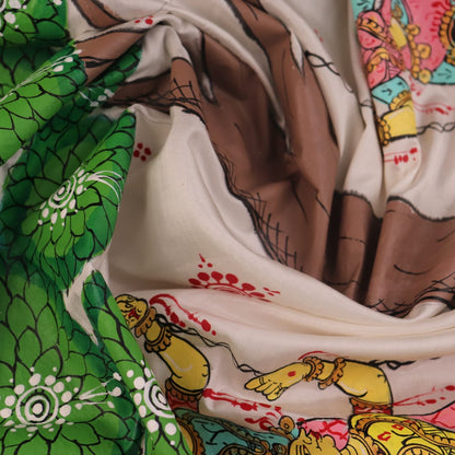 Close-up of white silk Patachitra saree fabric showing hand-painted texture and detail.