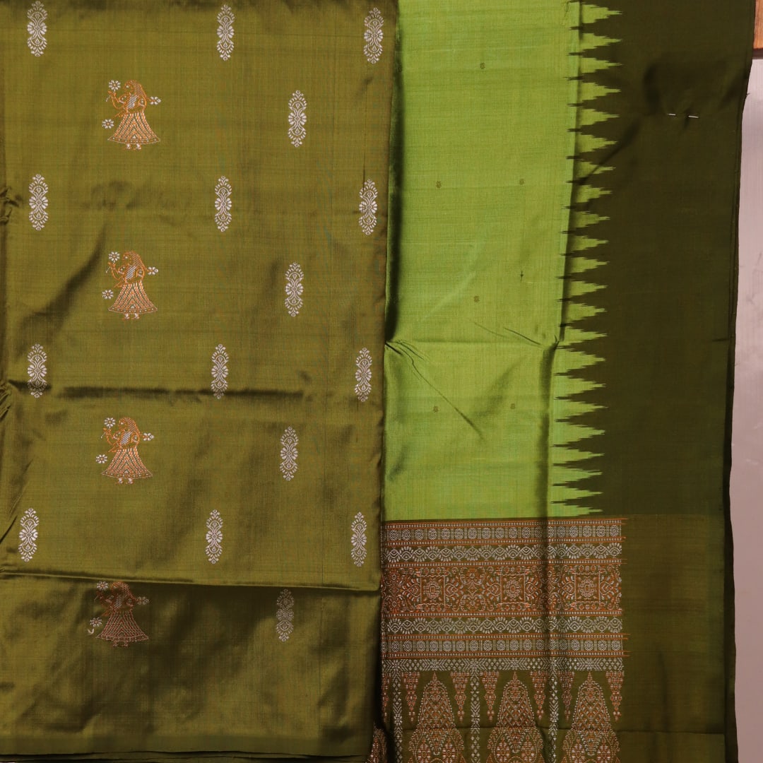 Close-up of the green Bomkai silk dress material's blouse piece with butta pattern.