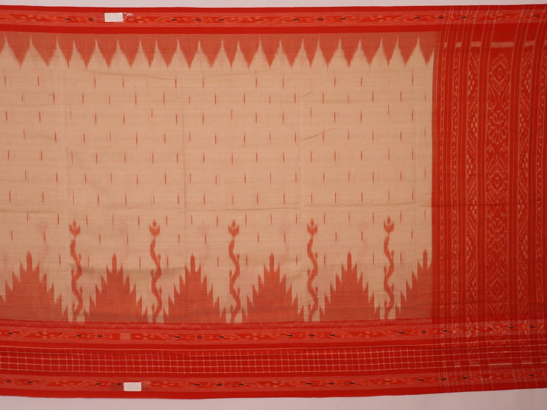 Cream and orange Sambalpuri cotton saree draped, showcasing traditional motifs and handloom texture.