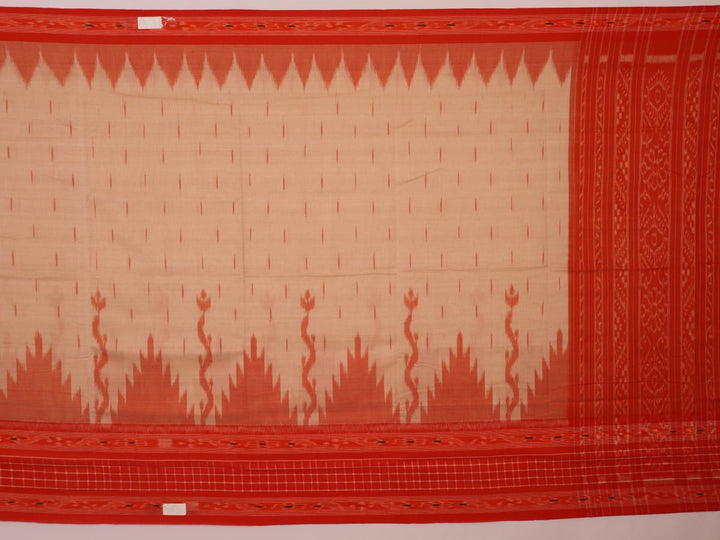 Cream and orange Sambalpuri cotton saree draped, showcasing traditional motifs and handloom texture.