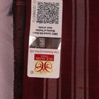 Close-up of grey and maroon Sambalpuri Silk Saree's butta pattern fabric texture.