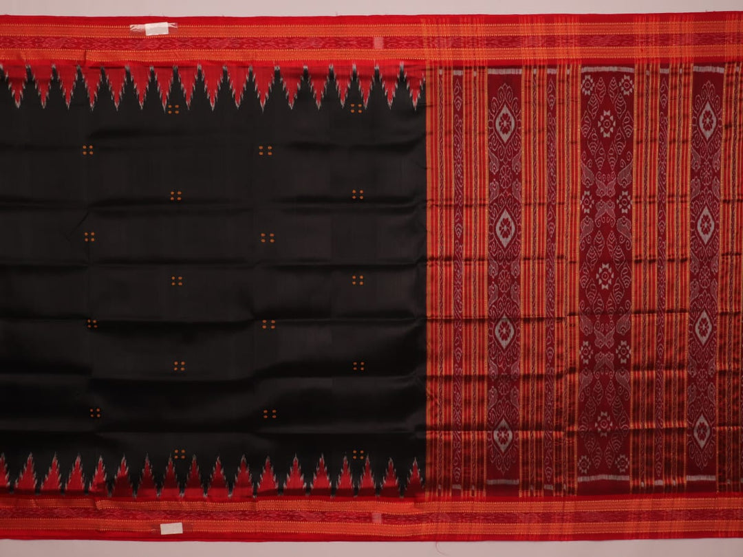 Draping view of a black Khandua silk saree with a red border and butta pattern